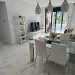 https://www.costablancahousing.com/wp-content/uploads/2023/11/Luxury-sout-west-apartment-with-view-on-the-pool-garage-and-storage-6-scaled.jpeg