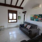 https://www.opgroupspain.com/images/listing_photos/12636_front_line_golf_detached_villa_with_pool_030925120330_lounge.jpg